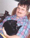 Blighter asleep in his daddy's arms.