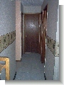 Main restroom door, laundry door is 1st one on right