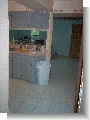 From in front of main restroom, hallway to kitchen