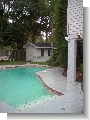Pool, shed, and part of upstairs master bedroom