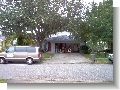 From neighbor's driveway